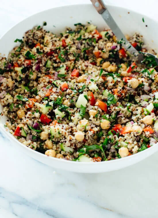 This image has an empty alt attribute; its file name is best-quinoa-salad-recipe-3-550x757-1.webp